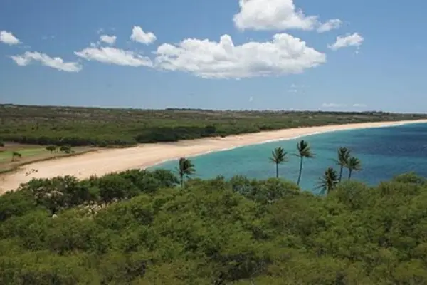 Nearby turquoise shoreline offers beautiful Pacific views and sandy beach scenery