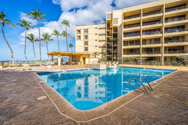 Sparkling pool surrounded by tropical scenery