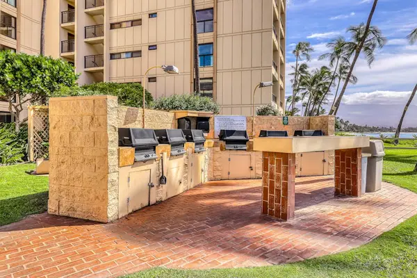 Spacious BBQ area with picnic seating