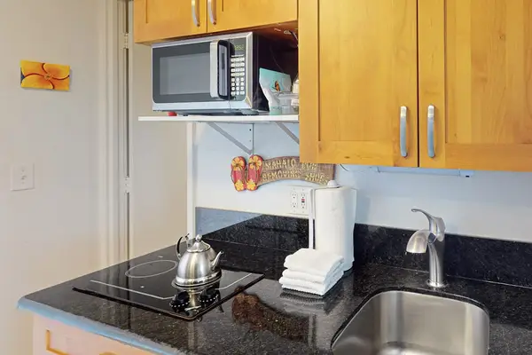 Prepare simple meals and refreshments in the convenient kitchenette, thoughtfully arranged for an easy and comfortable stay.
