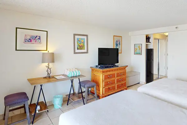 This inviting studio includes two double beds, making it an ideal space for friends or family traveling together.