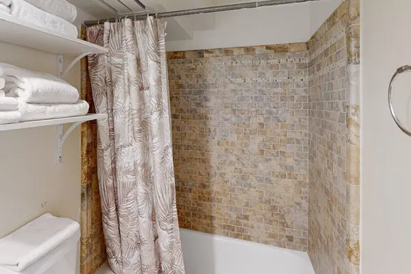 Enjoy the convenience of both a bathtub and shower, perfect for refreshing mornings and relaxing evenings.