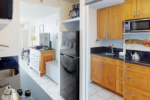 Enjoy the convenience of a well-equipped kitchenette, perfect for preparing quick meals, snacks, and morning coffee.