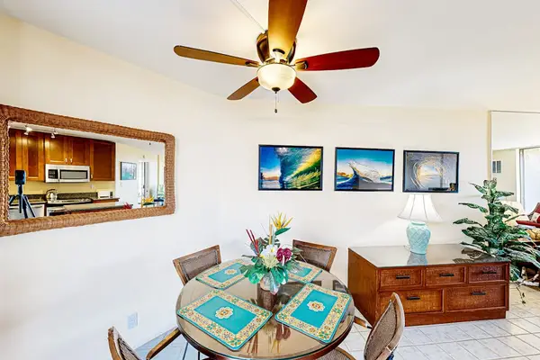 Dining Table Set for Four with Tropical Wall Art