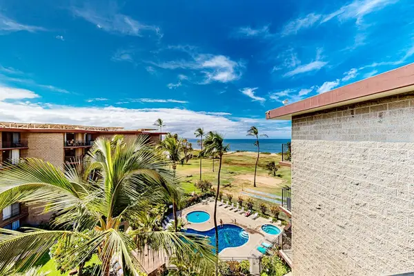 Elevated View of Resort Pools, Gardens & Ocean