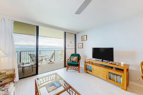Bright Coastal Living Room With Oceanfront Lanai