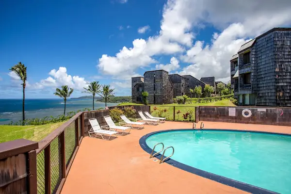 Community ocean front pool to relax in the sun.