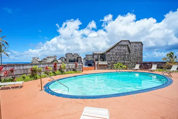 Community pool to enjoy the sun in the lounge chairs or cool off with a relaxing dip in the pool