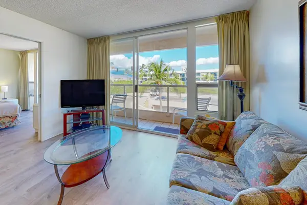 Cozy living area with a sofa bed, perfect for relaxing and watching your favorite shows
