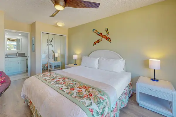 Comfortable bedroom with a charming mirror, perfect for getting ready each morning