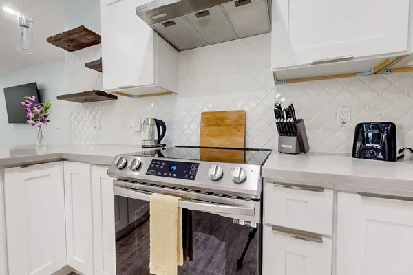 A well-appointed kitchen boasts modern appliances,  create hearty breakfasts or quick snacks with ease.