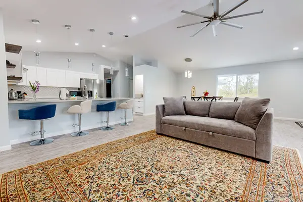Step inside to discover a cozy, open-concept living space with bright and airy decor.