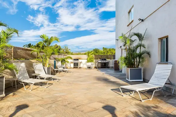 Lounge poolside under the Maui sunshine