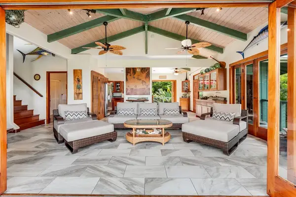 Spacious, airy, and beautiful! Relax in this gorgeous open-concept living lounge featuring impressive vaulted wood ceilings! 🛋️✨🌴