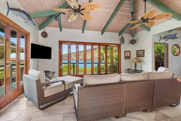 Your cozy island sanctuary! Close the doors for a peaceful, air-conditioned evening of relaxation on the plush sectional! 🛋️✨📺