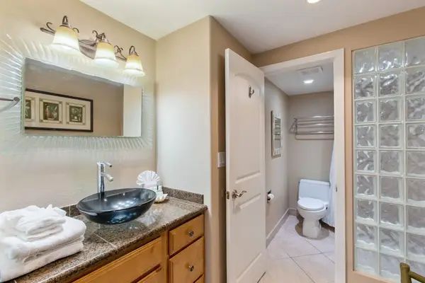 Modern bathroom with a spacious vanity and walk-in shower