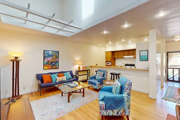 Comfortable open-concept kitchen, dining and living area welcomes memorable moments together always