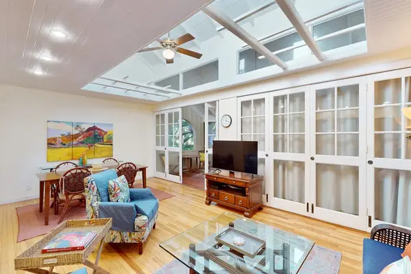 Bright living room welcomes everyone with cozy seating and inviting natural light