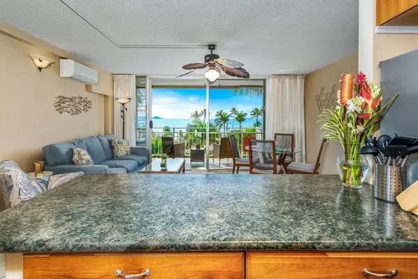 Kitchen with granite countertops and ocean views