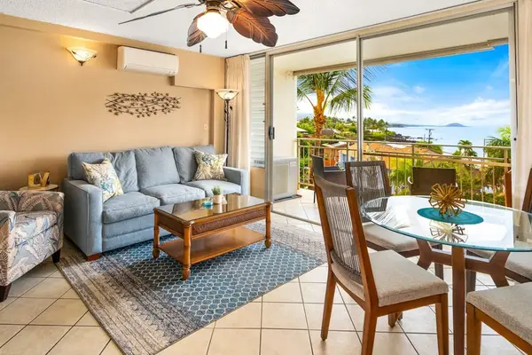 Bright living room with lanai access