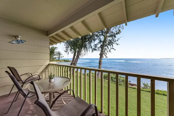 Private lanai with comfortable seating and breathtaking ocean views.