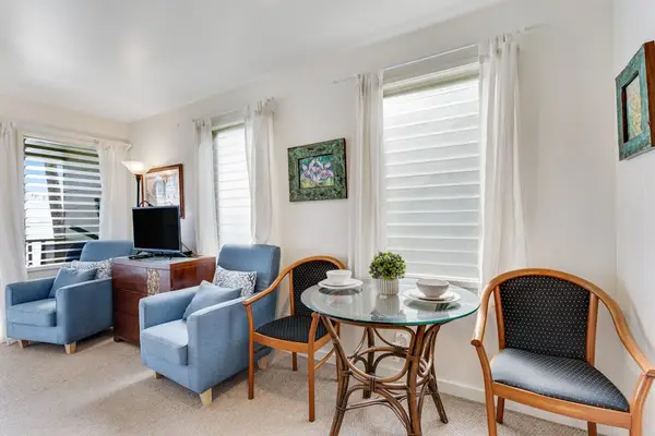 Bright dining area connected to the inviting living space.