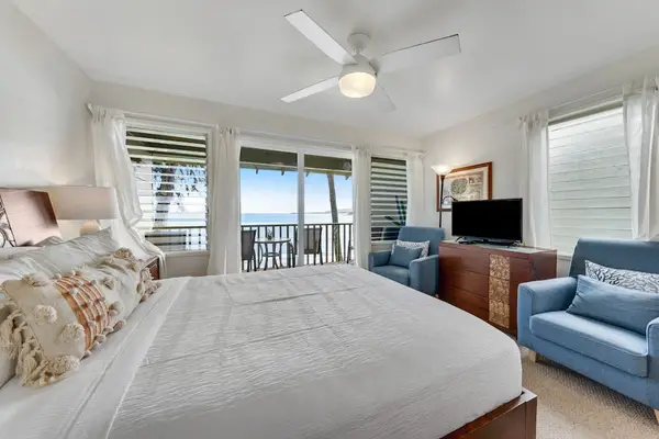 Wake up to beautiful ocean views from this inviting bedroom.