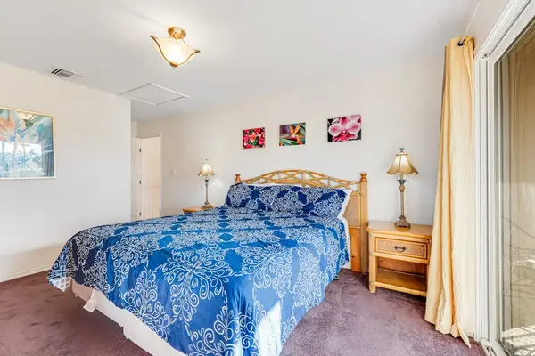 Master bedroom with king bed, flat screen tv, and your own private lanai.