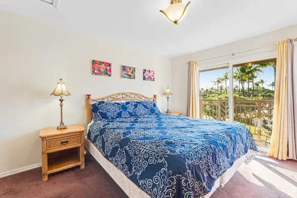Master bedroom with king bed, flat screen tv, and your own private lanai.
