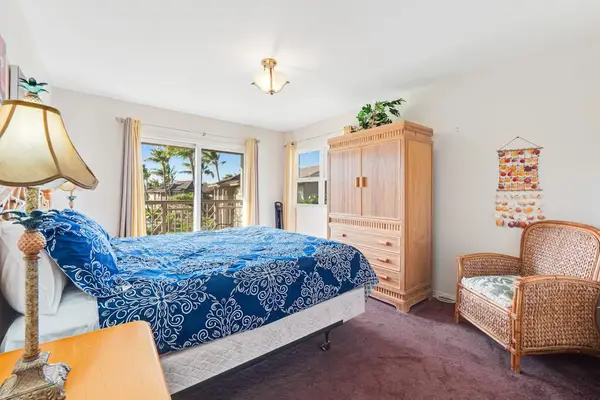 Master bedroom with king bed, flat screen tv, and your own private lanai.