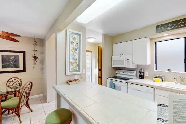 Full kitchen for all of the chef's needs and barstools for extra seating.
