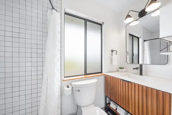 Bright Bathroom With Walk-In Shower