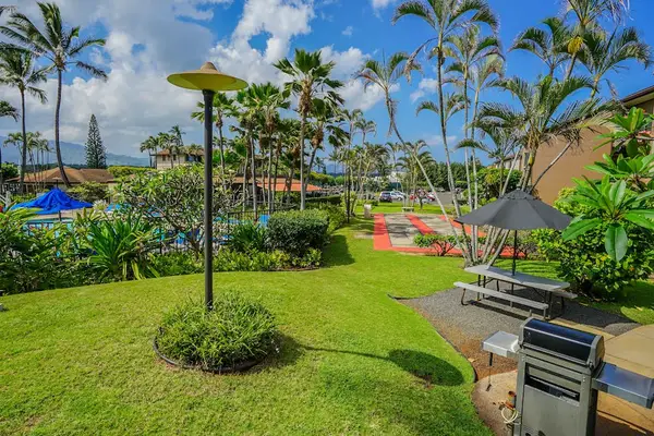 Pono Kai Resort, includes 12-acre grounds, an outdoor pool, a hot tub, a shuffleboard area, a barbecue facility with gas grills, a sauna, golf putting greens, Ping-Pong tables, a croquet lawn, a fitness center, tennis courts, and laundry facilities.