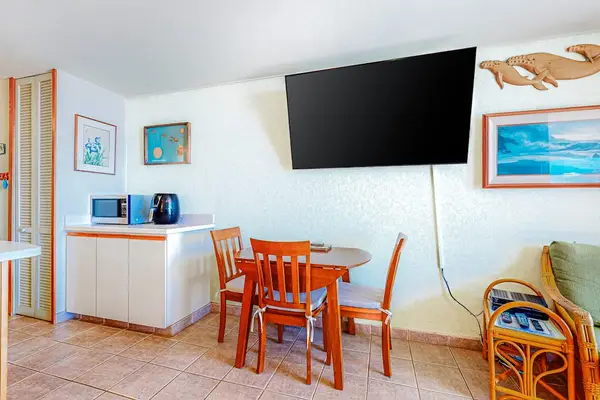 Dining room table for private dinners in and a flat screen tv for your entertainment.