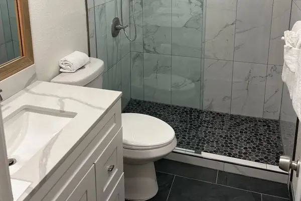 Full bathroom with walk-in shower