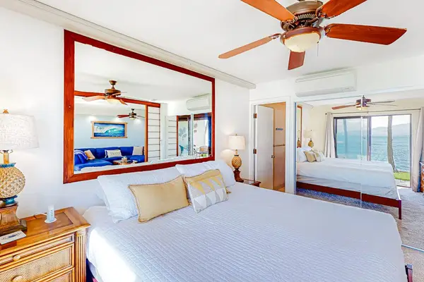 Master bedroom with en suite bathroom, ceiling fan for your comfort and ocean front views.