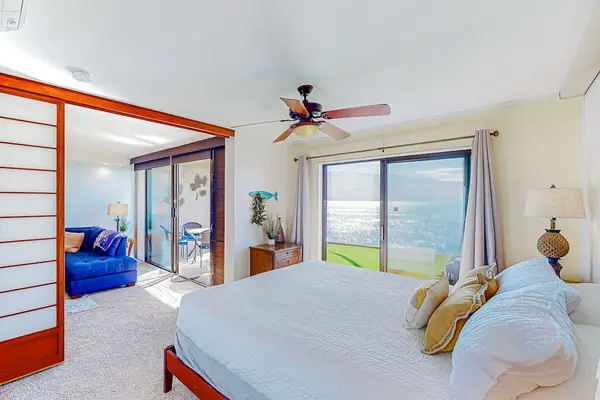 Master bedroom with a private lanai access for fabulous ocean views.