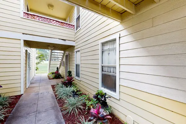 Peaceful courtyard leading to the condo