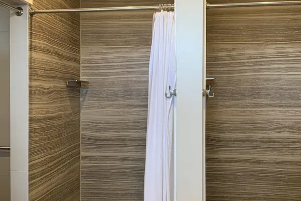 Full bathroom with walk-in shower for added convenience