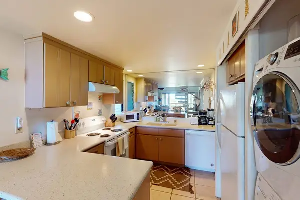 Prepare favorite meals easily in this spacious and functional kitchen