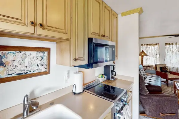Well Equipped Kitchen With Island Appeal