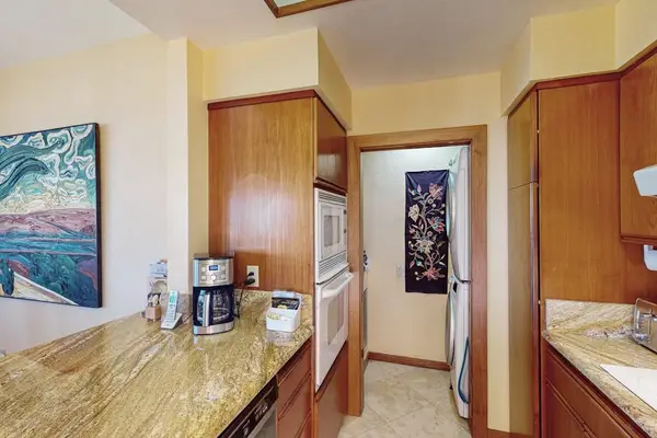 Built-In Ovens, Coffee Station & In-Unit Laundry Access