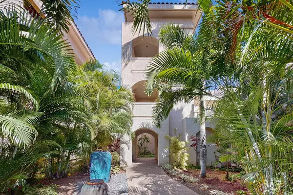 Tropical Courtyard Entrance & Arched Architectural Tower