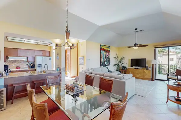 Open-Concept Vaulted Layout Connecting Dining & Kitchen