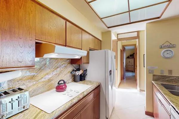 Modern Cooktop, Refrigerator & Custom Wood Cabinetry