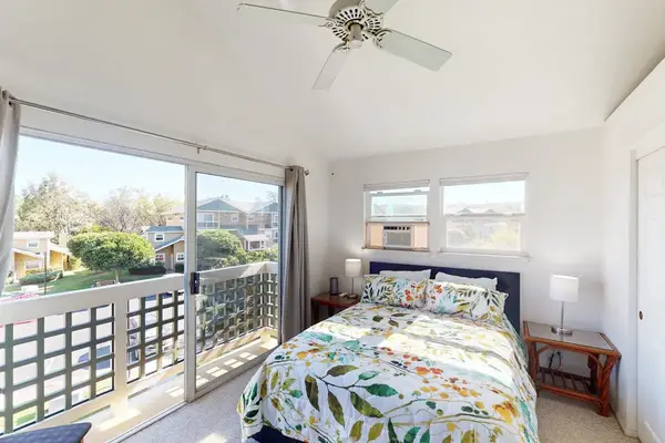 Guest room with queen bed.