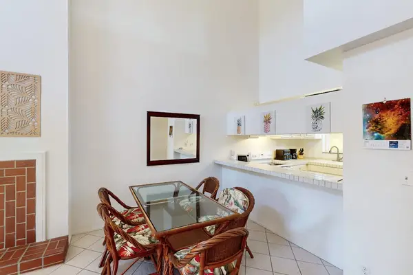 Dining room with a table for four, perfect for a game night or dinner in, after a long day.