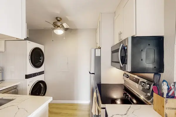 Modern Kitchen With In Unit Laundry