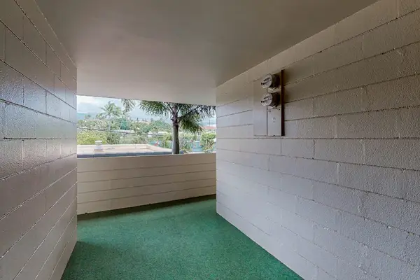 Covered Breezeway Through Tropical Grounds