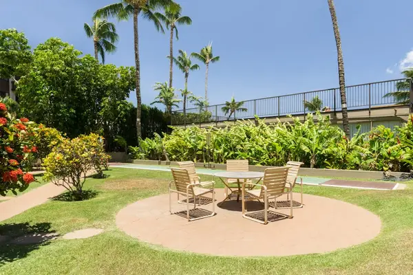 Outdoor dining area and shuffleboard court.